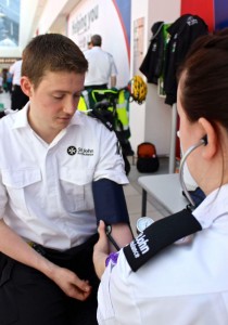 Steven has his blood pressure checked by Rose at the 2014 Market Green demo.